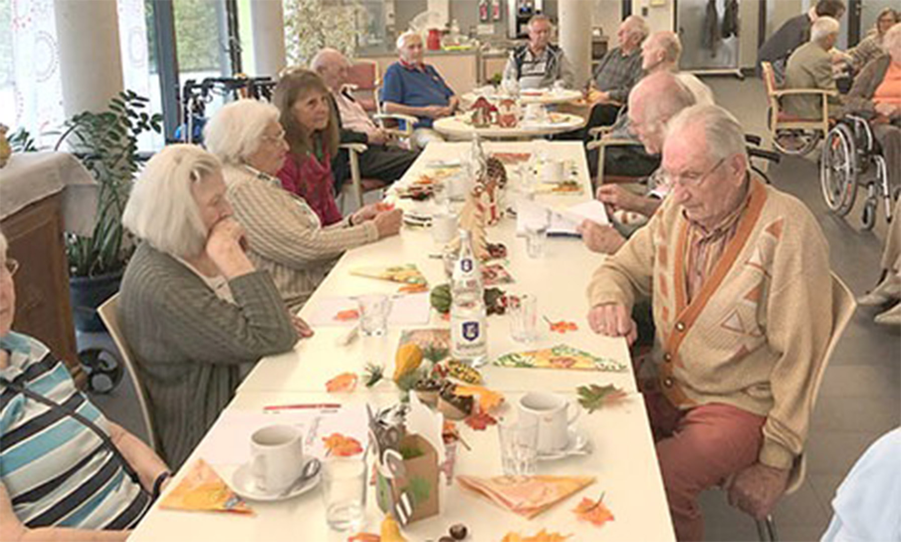 Evdiak Bild von einem Tisch mit Senioren